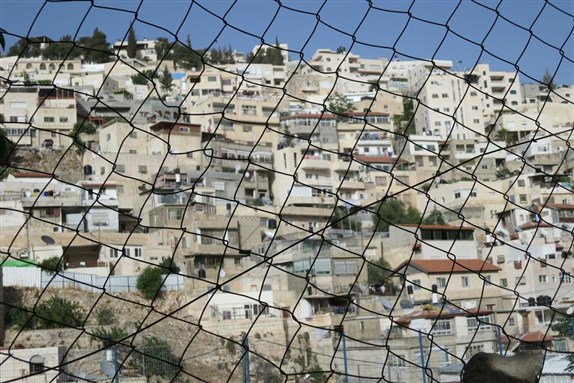 [Communities in Silwan forced to build vertically because of restrictive zoning laws. Image by Ilise Cohen.] 