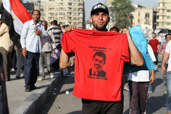 [Egyptian man who was part of Tahrir Square 24 June 2012 celebration of Mohammed Morsi`s election as president. Image by Sabri Khaled via Flickr]
