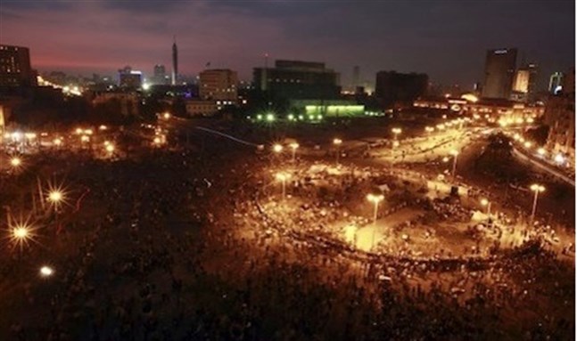 [Tahrir Square on Monday night, a scene starkly reminiscent of last January`s 18-day uprising. Image from Reuters]