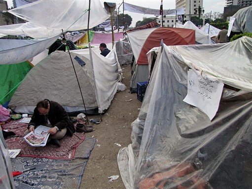 [A view inside the \"tent city\" in and around Tahrir Square. Photo by Sherif Hashem. Image from Wikimedia Commons.]