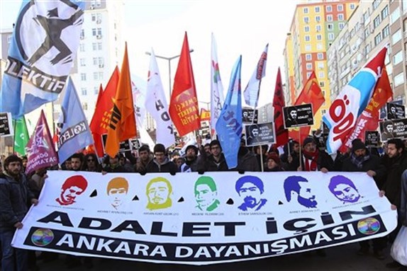 [Thousands of Turkish protesters hold a banner with images of June protest victims that read: \"We are Here for Justice,\" outside a courthouse in the city of Kayseri, Turkey, 3 February 2014. More than two thousand riot police were deployed Monday as four of their colleagues stand trial for allegedly beating to death Ali Ismail Korkmaz, a nineteen-year-old student during anti-government protests last June. Photo by STR/AP Photo.]