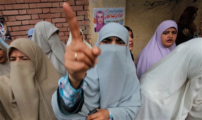 [Women supporters of the Muslim Brotherhood are heavily campaigning for the group on 28 November 2011. Image from Reuters]
