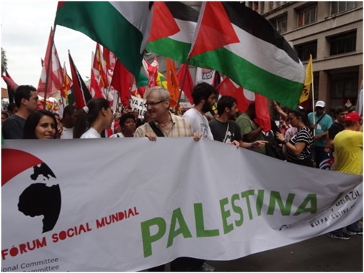[Members of the Brazilian trade union, CUT, march on 29 November (2012), the International Day in Solidarity with the Palestinian People, in the Forum’s inaugurating procession. Image by Charlotte Kates]