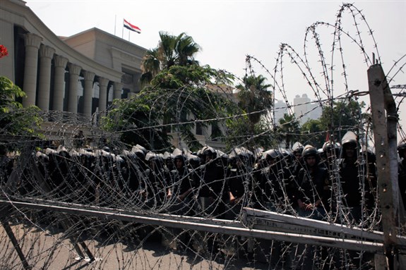 [Egyptian soldiers stand guard during a protest in front of the Supreme Constitutional Court, Egypt`s highest court, in Cairo on Thursday 14 June 2012. Image from AP Photo/Nasser Nasser)]