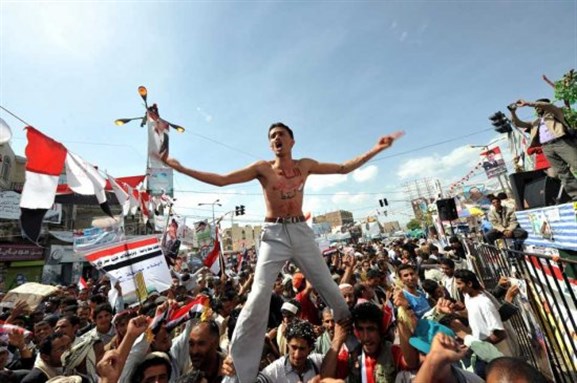 [Celebrations in San`a. Image from monstersandcritics.com]